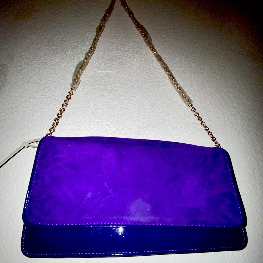 Purple leather clutch